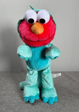Sesame Street Dino Stomp Elmo 13-Inch Plush Stuffed Animal Sings and Dances