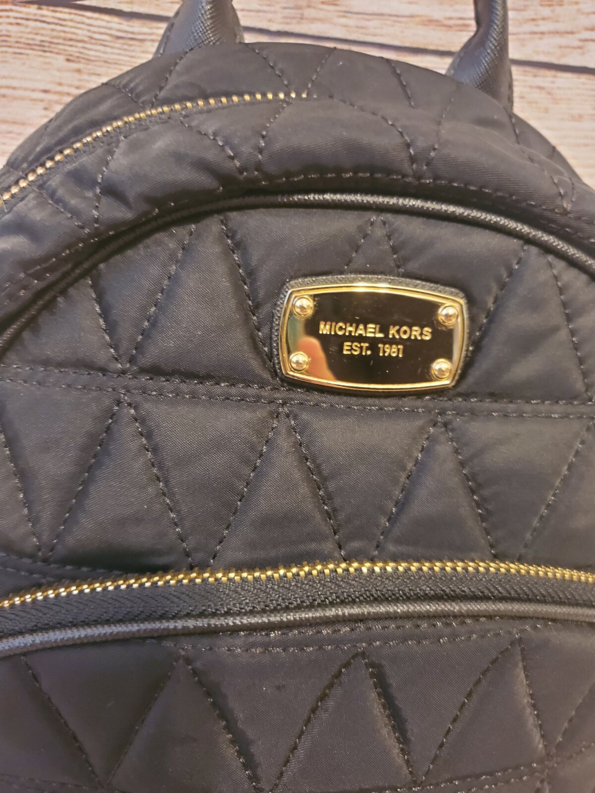 Michael Kors Abbey Quilted Pyramid Backpack Gem