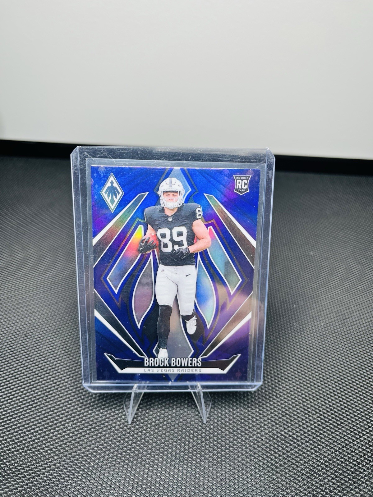 2024 Panini Phoenix - Rookies Brock Bowers #165 Purple (RC)