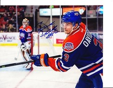EDMONTON OILERS BRANDON DAVIDSON SIGNED PUCK TRICK 8X10