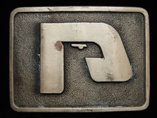 OF03117 VINTAGE 1981 **UNKNOWN COMPANY LOGO** SOLID BRASS O.C. TANNER BUCKLE