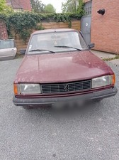 Calandre Peugeot 305