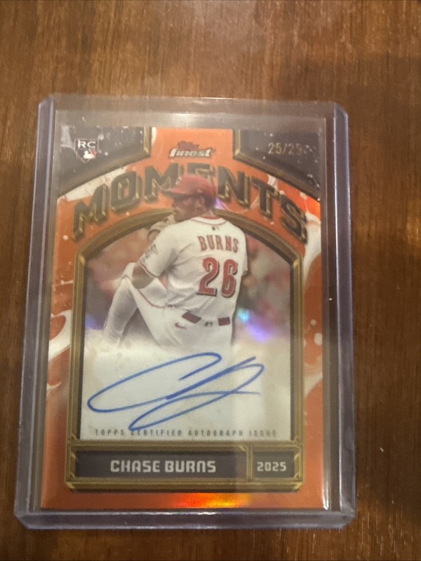 2026 Topps Finest Chase Burns Rookie Moments Auto Orange Refractor /25 Reds RC
