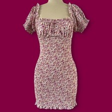 Shirred mini dress in ditsy floral print, with square neckline and frill trim. 