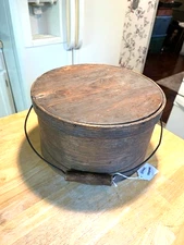 1800S 11 1/2" IN DIAMETER REMAINS OF BLUE PAINT PANTRY BOX WITH WOOD HANDLE