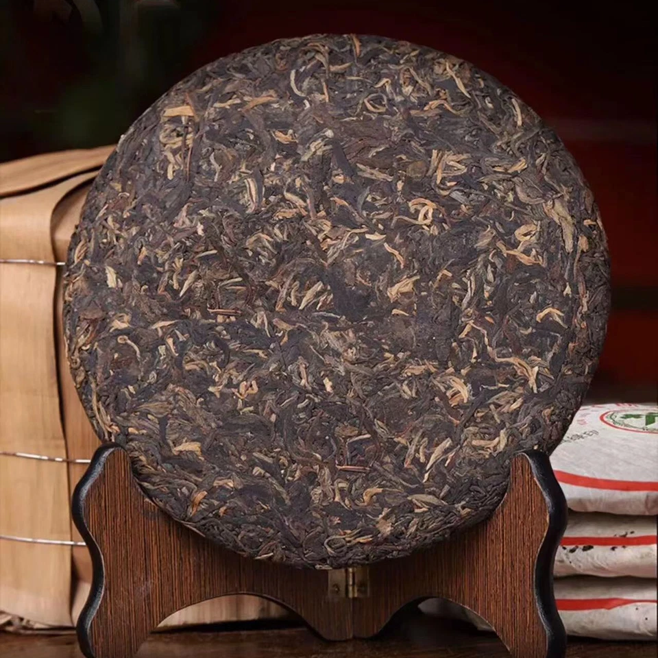 Té crudo Yunnan Qizi Puerh 2000 7542 envejecido crudo Pu-erh pastel de té antiguo té Pu'er Foto 2 de 4