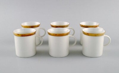 Six Rosenthal Berlin coffee cups in porcelain with gold edge. Mid-20th c.