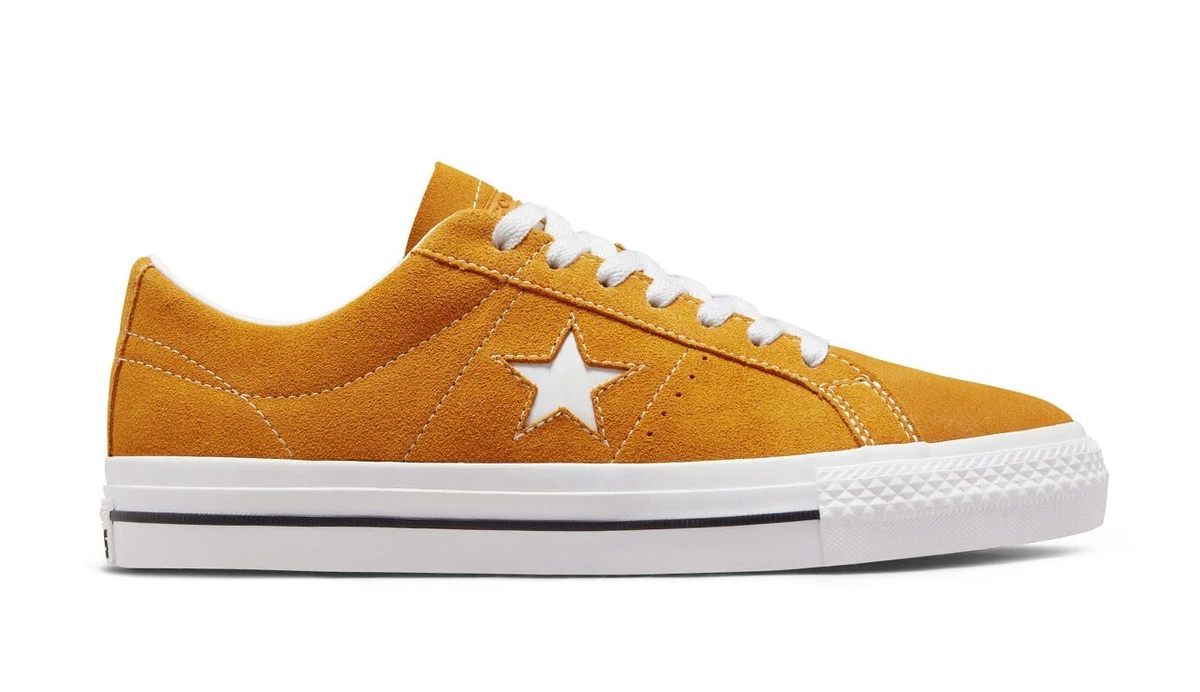 Mustard best sale colored converse