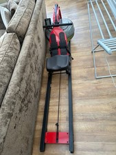body power rowing machine red