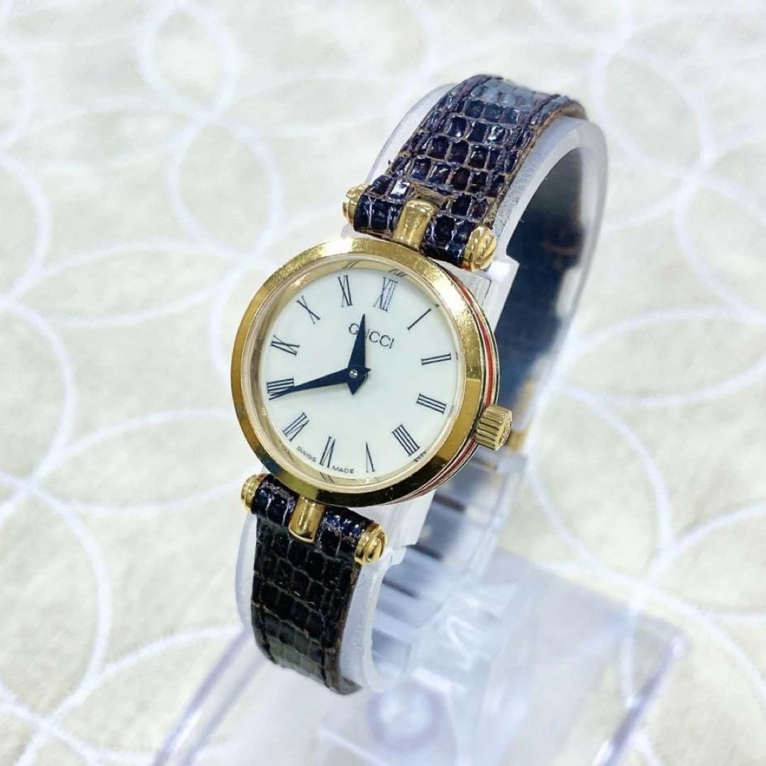 Montre Gucci 2000L Sherry Line   Style ancien, design compact   Comme