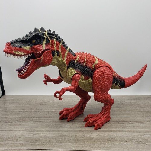 red tyrannosaurus rex toy