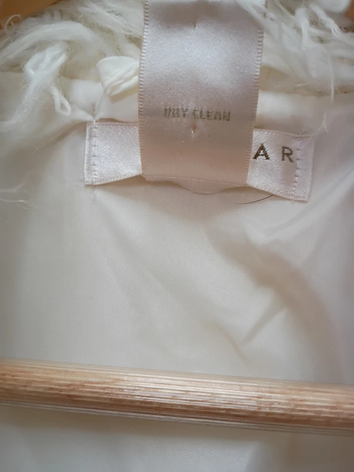 Chaleco mediano de piel de cordero mongol sintético blanco Foto 3 de 3