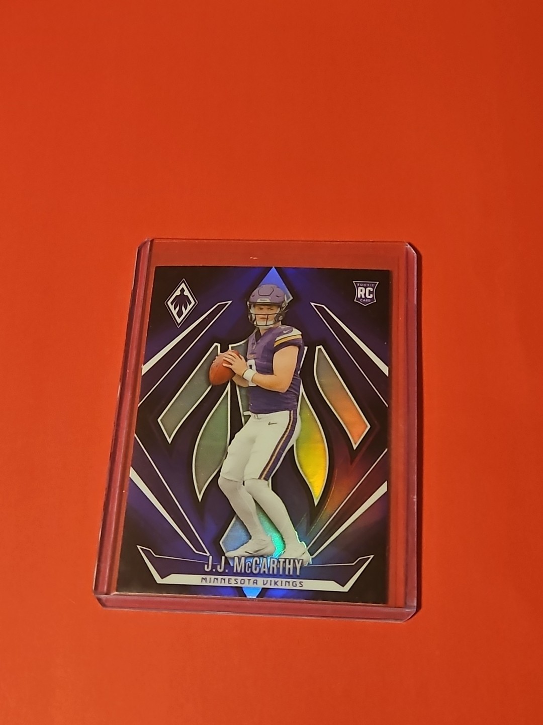 2024 Panini Phoenix - Rookies J.J. McCarthy Color Match #185 Purple (RC)