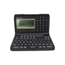 Vintage Sharp YO 400 Electronic Organizer 32KB Digital PDA Calculator Scheduler