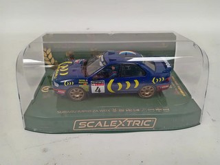 Scalextric Subaru Impreza WRX 1995 World Champion 1/32 Scale Slot Car