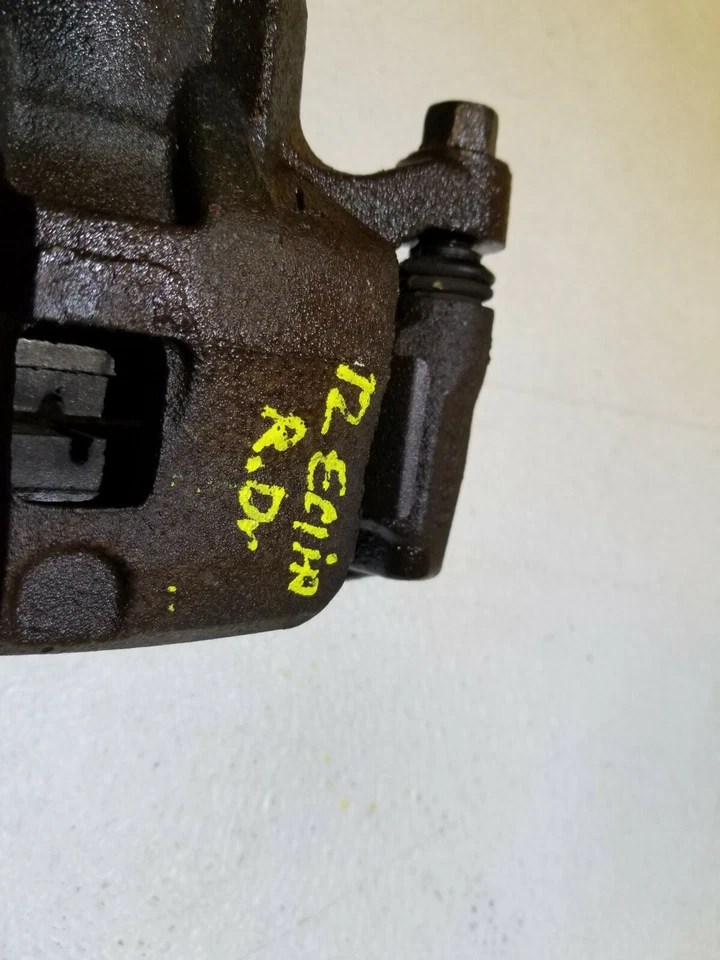 09 10 11 12 MITSUBISHI ECLIPSE 2.4L PINZA FRENO CONDUCTOR TRASERO IZQUIERDO OEM 51K millas Foto 2 de 4
