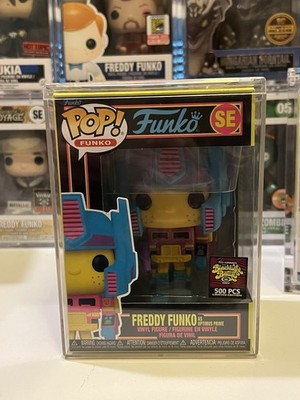 Freddy Funko as Optimus Prime (Blacklight) LE 500pc | 2022 SDCC Funko Fundays