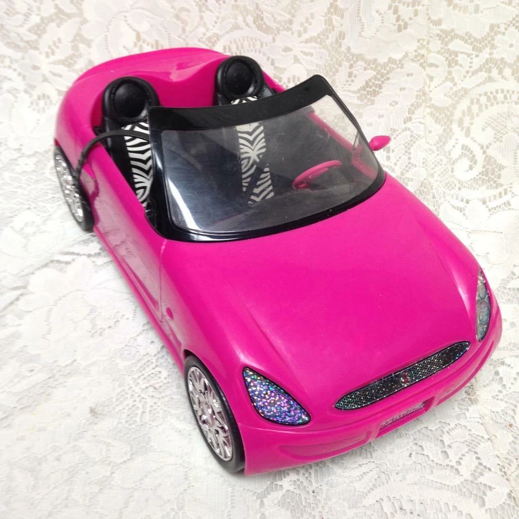 Barbie doll sales pink car