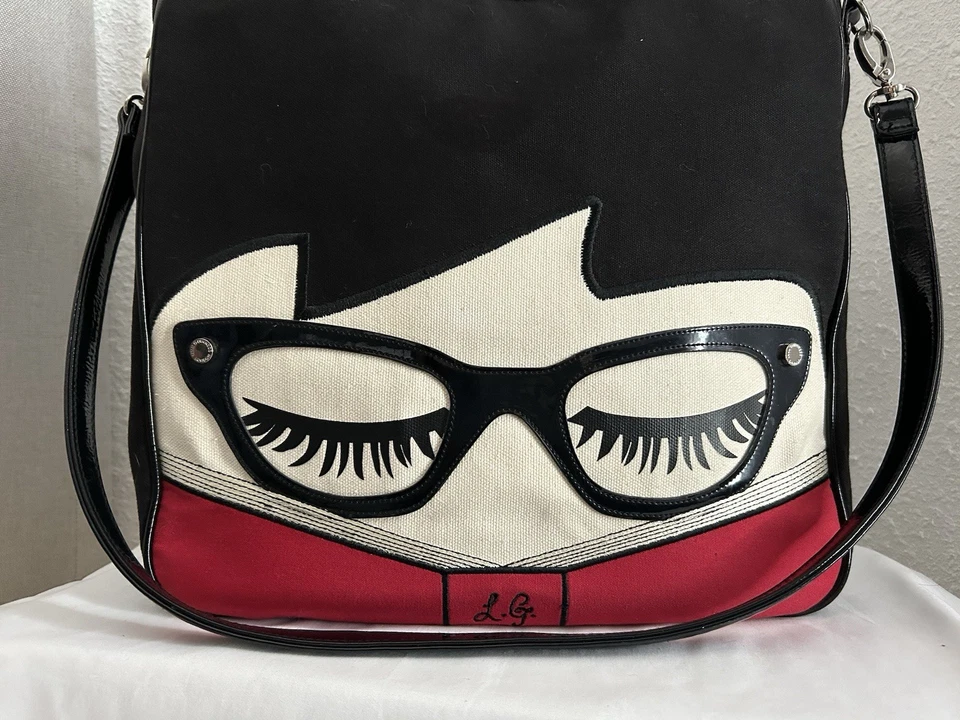 Muñeca bibliotecaria Lulu Guinness Face Wanda Eyeglasses Lashes Tote / Bolso de hombro Foto 2 de 4