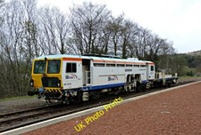Foto 6x4 estación de tren Garelochhead DR 73933, un Plasser &amp; Theurer c2015