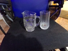 very nice  glass pitcher and glass drinking glass