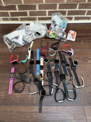 LOT OF 38 Smart Watch Fitness Activity Trackers Fitbits ECT (UNTESTED) W Bands