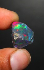8,80 ct natürlicher schwarzer äthiopischer Welo Feueropal grob, Multi Feuer S...