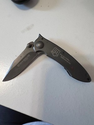 Modern Magnum Boker folding pocket knife with 811 utility awareness markings