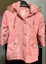 girls pink coat, age 7-8 years with faux fur hood from Tu