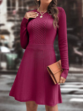 A Cable-Knit Sweater Dress With A Pleated Skirt, Suitable For Autumn And Winter.