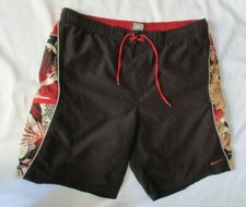 NIKE BLACK AND RED SWIM TRUNKS / BOARD SHORTS - SIZE MEDIUM