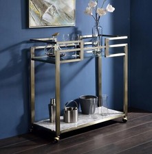 Acme Neilo Metal Frame Serving Cart with Glass Top Shelf in Clear and Wire Brass