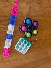 Fidget spinning  Pop it bracelet and Key chain. Stress relievers