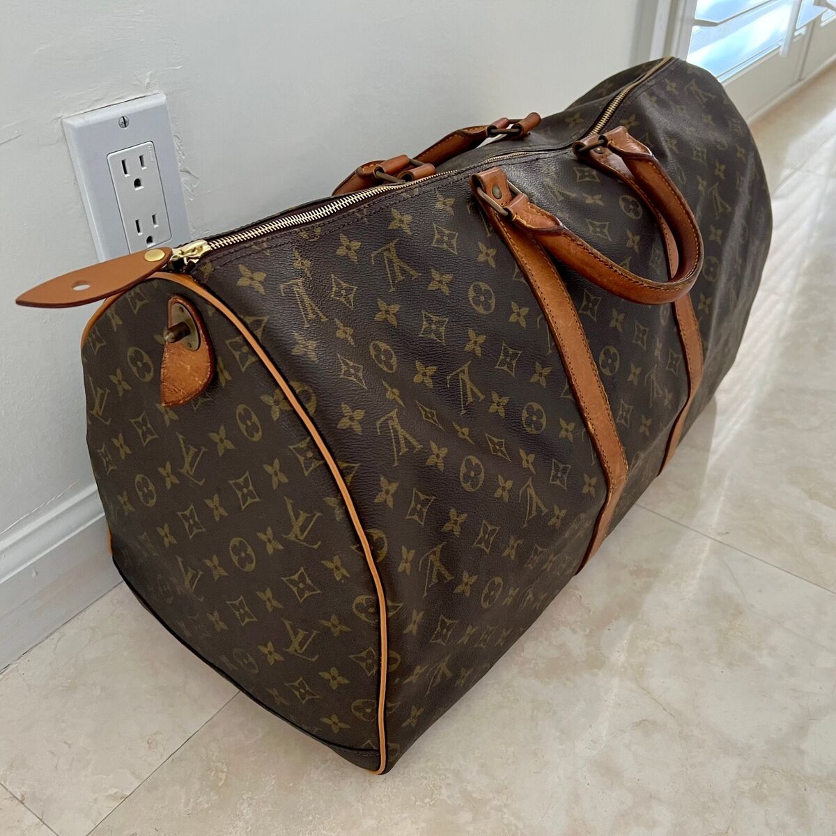 Louis Vuitton Vintage Keepall 55 Travel Duffle Bag in Brown Louis Vuitton Vintage Keepall 55 Travel Duffle Bag in Brown