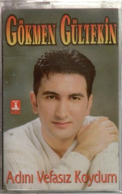 19212--Gökmen Gültekin ADINI VEFASIZ KOYDUM      Jelatinli 1.Basim   1998