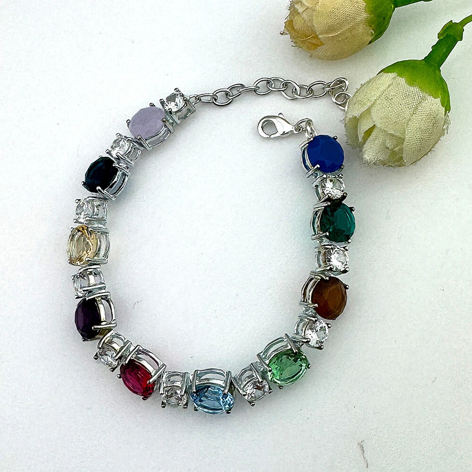 Pulsera con dije de turmalina topacio azul místico corte redondo regalo navideño Foto 2 de 2