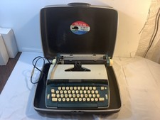 SCM Smith-Corona Seventy Blue Portable Electric Typewriter & Adding Machine thumbnail