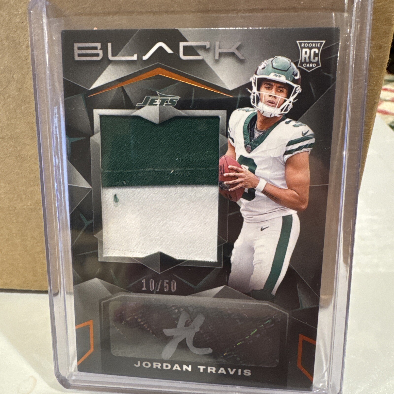 2024 Panini Black Jordan Travis Rookie Patch Autograph Citrine /50 Jets #223