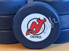 Cale Hulse Signed NJ Devils Puck (Stanley Cup Champion)