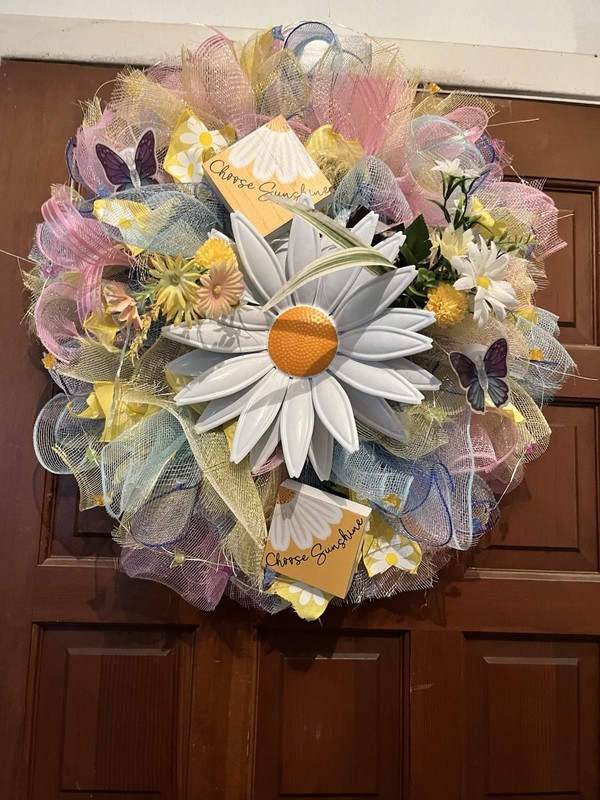 25 inch daisy wreath with butterfly lights and light up butterflies.