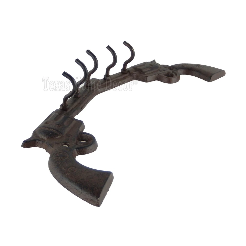 Pistolas cruzadas gancho de pared pistola revólver llave estante hierro fundido estilo antiguo occidental Foto 2 de 2