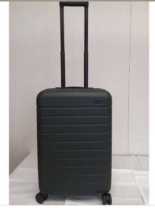 The AWAY Travel BIGGER CARRY-ON Suitcase with built-in USB Charger New NIB Black
