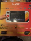 ATARI Gamestation GO -- Portable 200+ Video Game System w/case, grip, A/C, more,