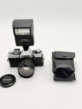 Minolta XG-7 35mm SLR Camera with 50mm 1:1.7 Lens and Flashlight