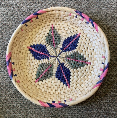 Round woven coil basket with leaf motif   11'' wide, 2'' tall  blue/green design