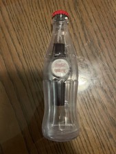 Orologio da polso Coca-Cola in vetrina per bottiglie 
