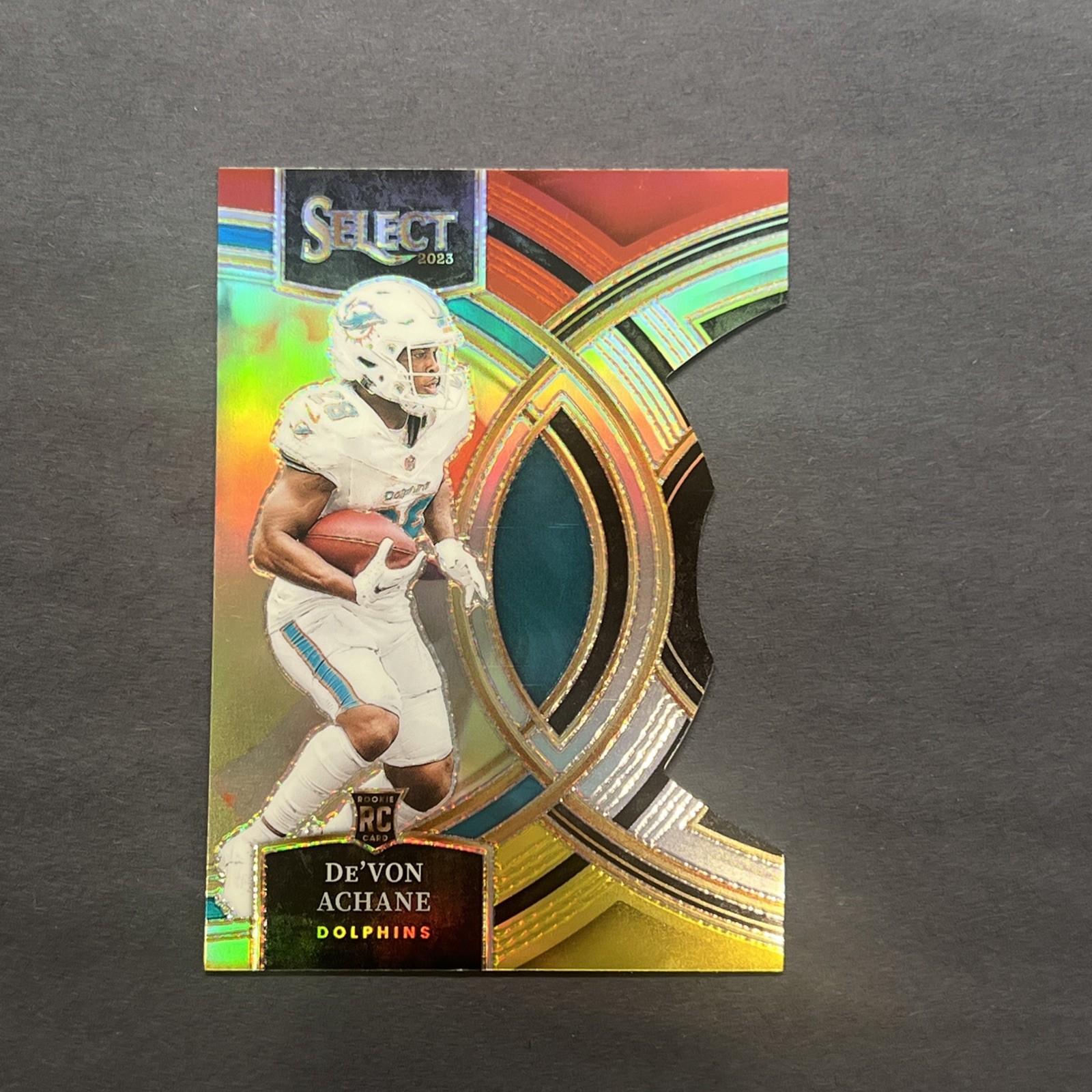 2023 Panini Select - Premier Level De'Von Achane Red & Yellow Prizm Die-Cut (RC)