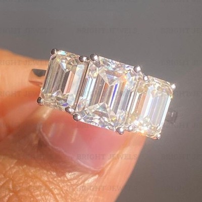 4CTW Emerald Cut Moissanite Three Stone Engagement Ring In 14k White Gold Plated