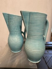 Pair of Crown Devon 1930’s ribbed vases with geometric features.