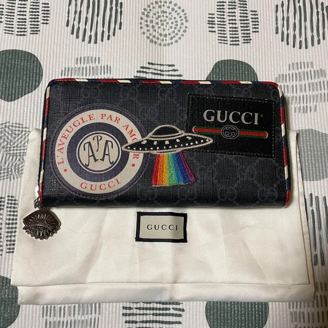 Portefeuille long GUCCI Night Courier GG Supreme fermeture éclair ronde 496342 PVC cuir